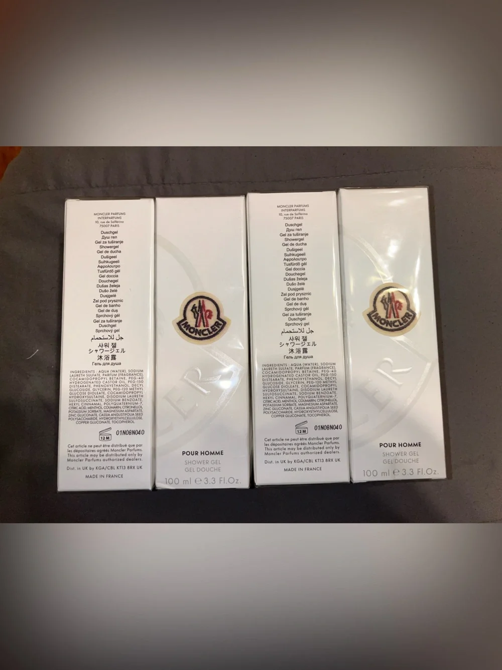 Moncler Pour Homme Fragrance 4 piece shower gel- White and Red Accents